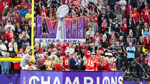 Feb 11, 2024; Paradise, Nevada, USA; Kansas City Chiefs quarterback Patrick Mahomes (15) hoists the Vince Lombardi Trophy after defeating the San Francisco 49ers in Super Bowl LVIII at Allegiant Stadium. Mandatory Credit: Stephen R. Sylvanie-USA TODAY Sports  
